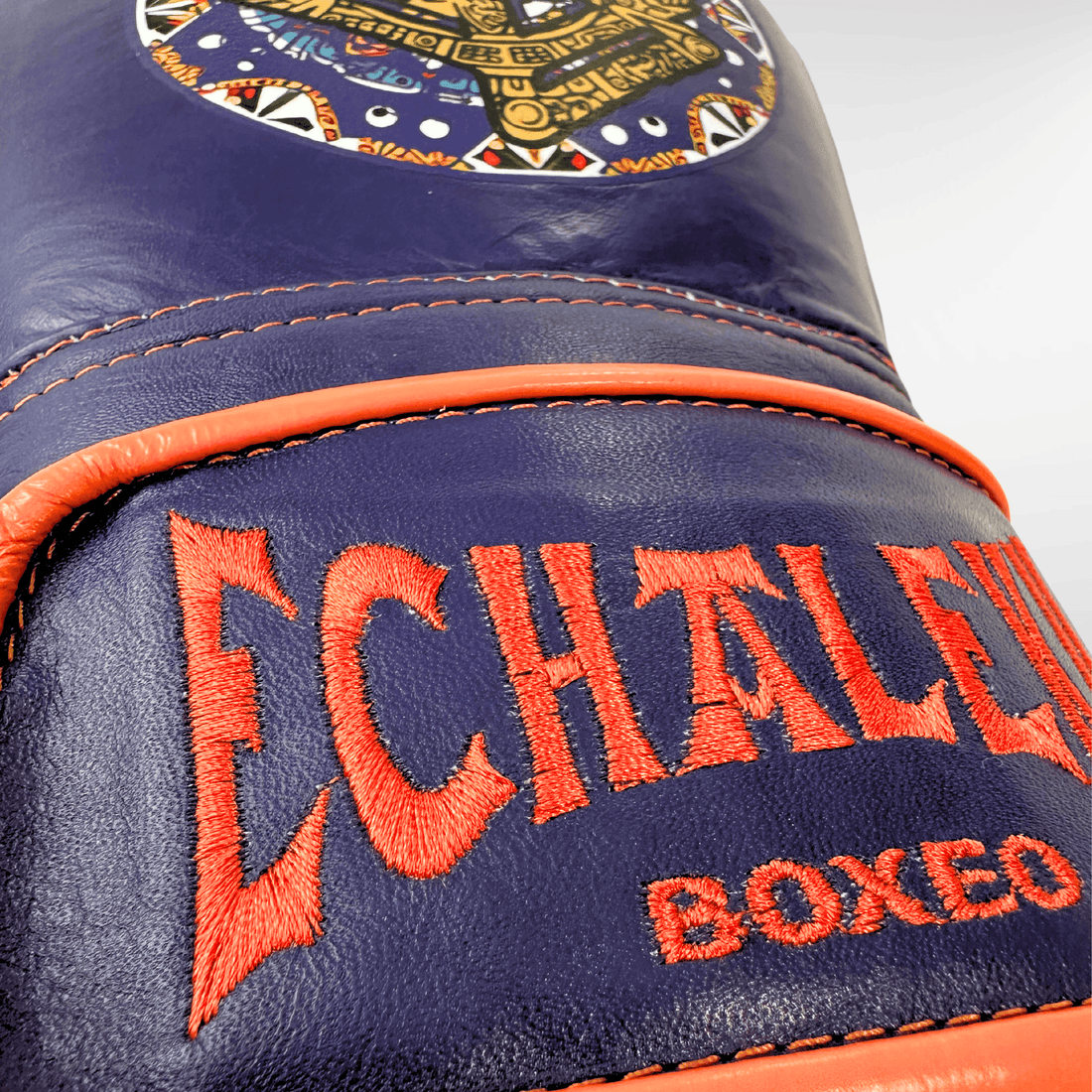 Handmix.GUANTES PREMIUM ENTRENAMIENTO BOXEO PROFESIONAL: COLECCIÓN AZTECA fabricada en México. (AZTECA). Morado y Naranja + Negro y Blanco - Echaleku Boxeo