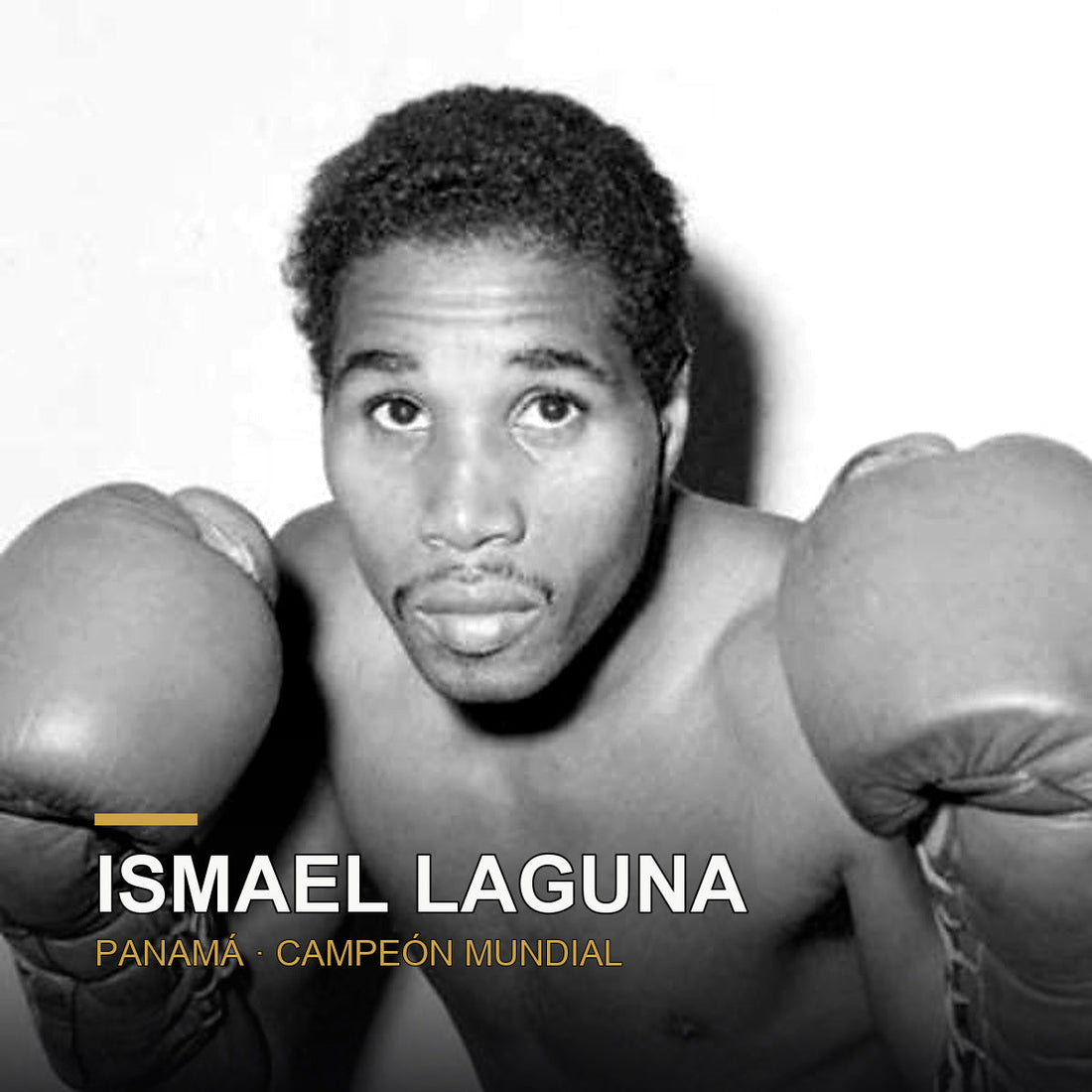 Ismael Laguna con guantes de boxeo, campeón mundial panameño del peso ligero