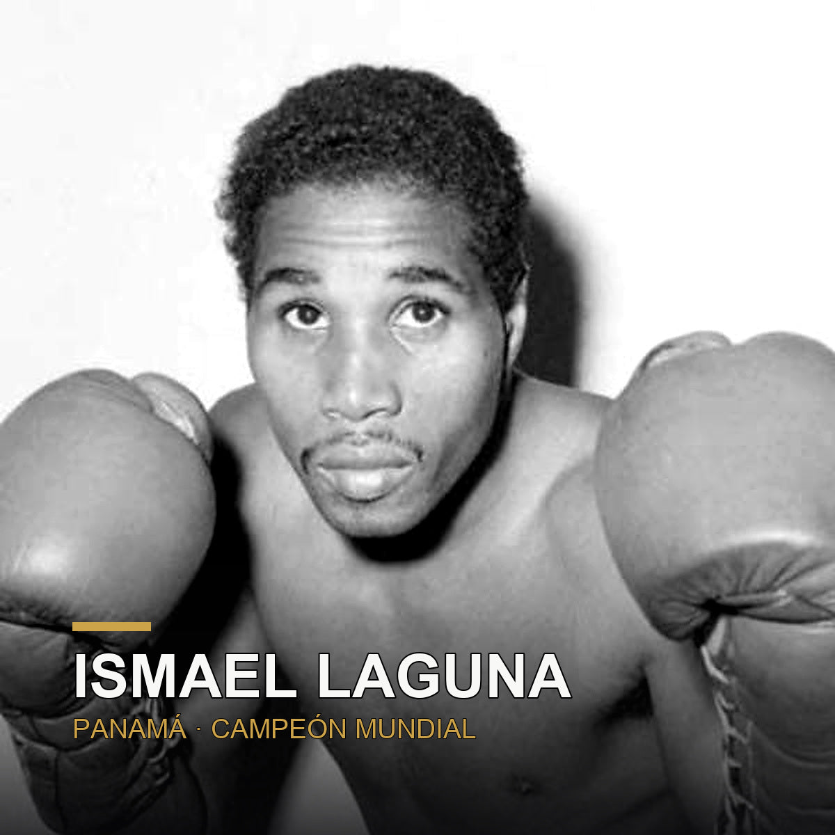 Ismael Laguna con guantes de boxeo, campeón mundial panameño del peso ligero
