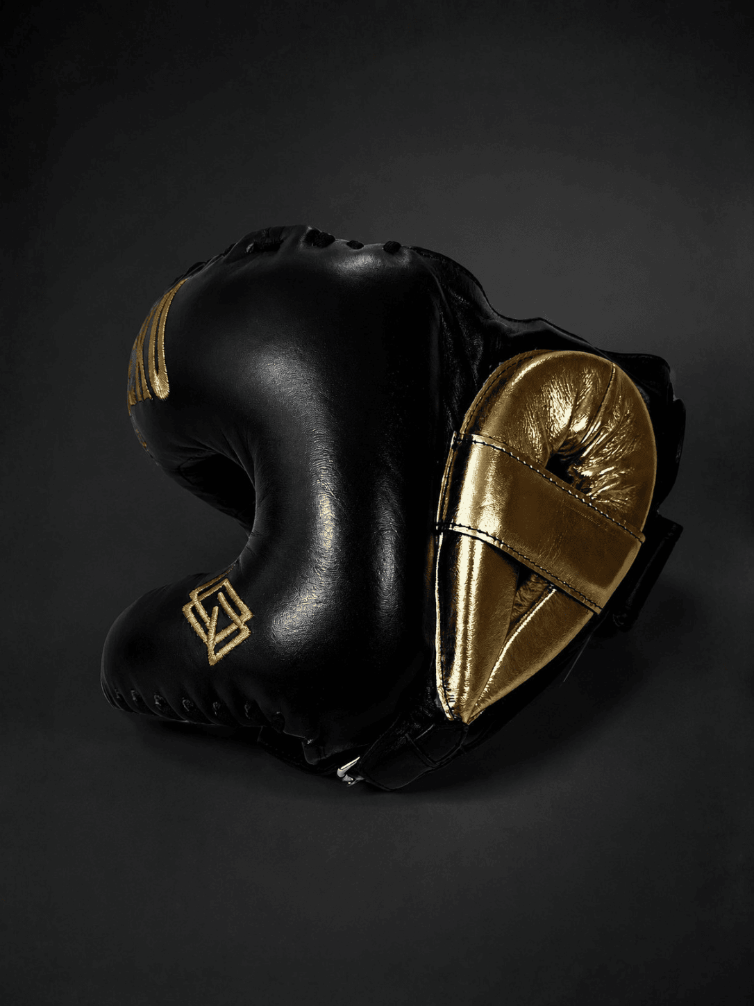 Vista trasera del casco de boxeo de barra personalizable Echaleku Boxeo negro y oro
