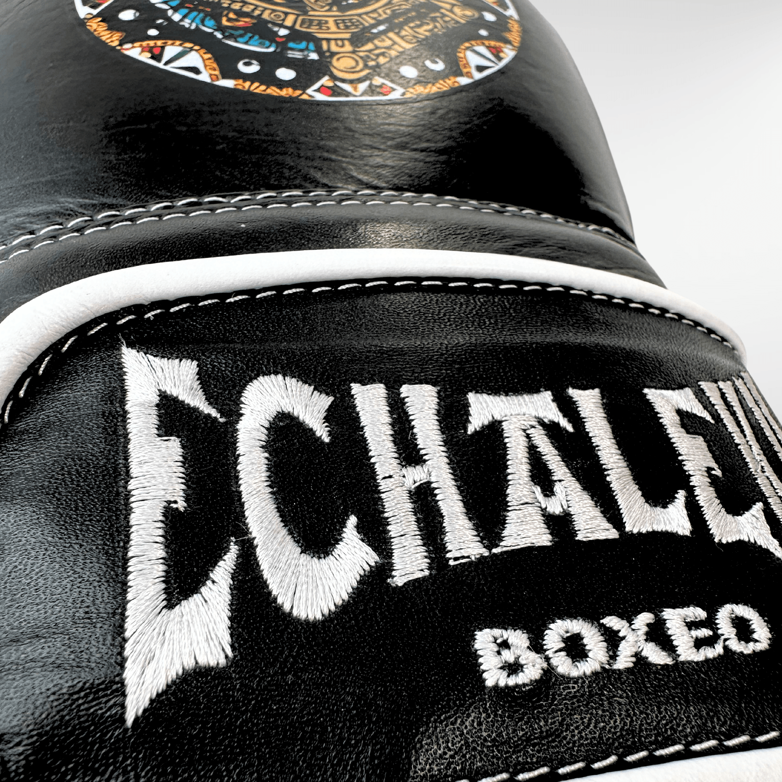 GUANTES PREMIUM ENTRENAMIENTO BOXEO PROFESIONAL: COLECCIÓN AZTECA fabricada en México. Negro Noche Color Negro y Blanco. - Echaleku Boxeo