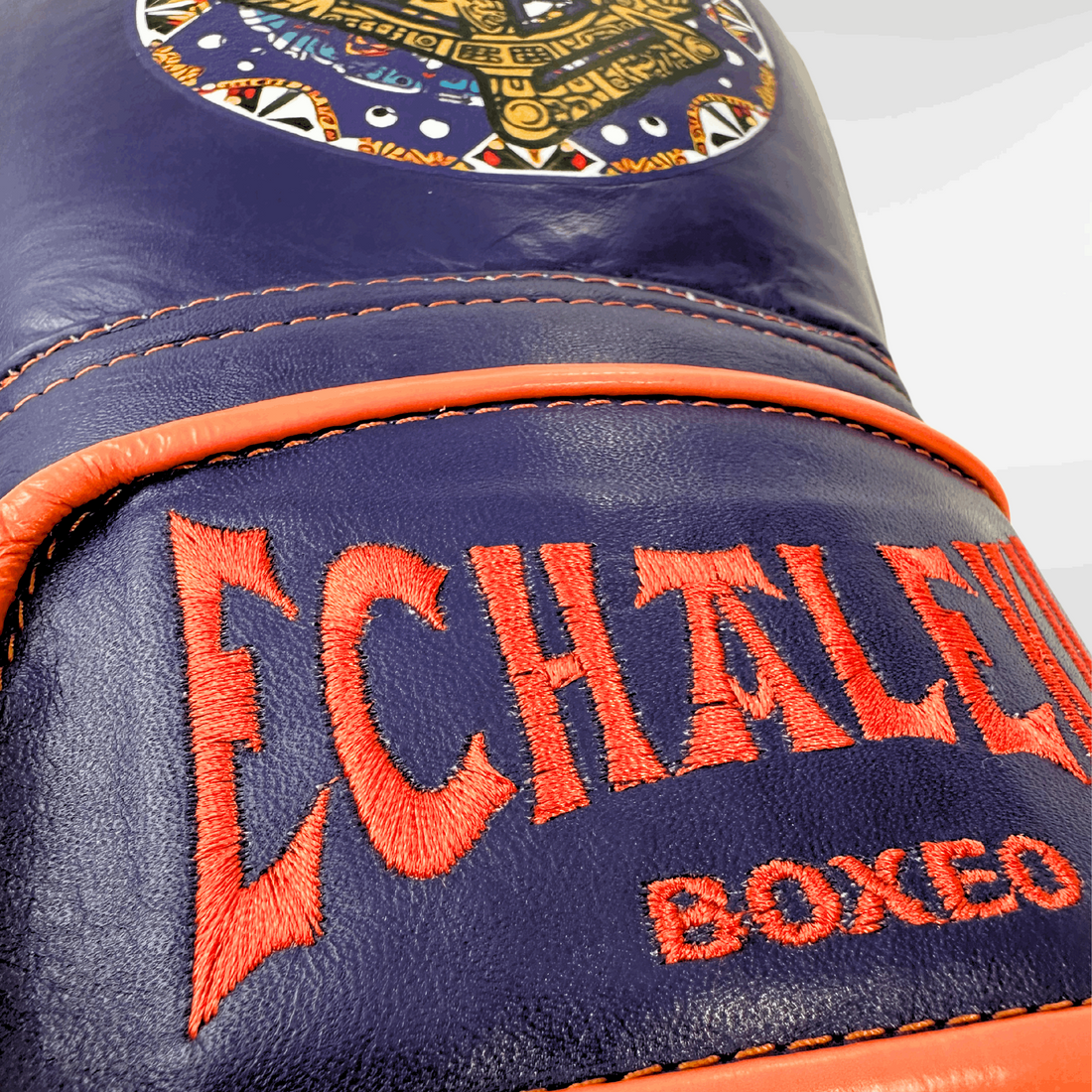 DUPLA Casco Barra Piel Negro y Dorado + AZTECA Morado y Naranja - Echaleku Boxeo