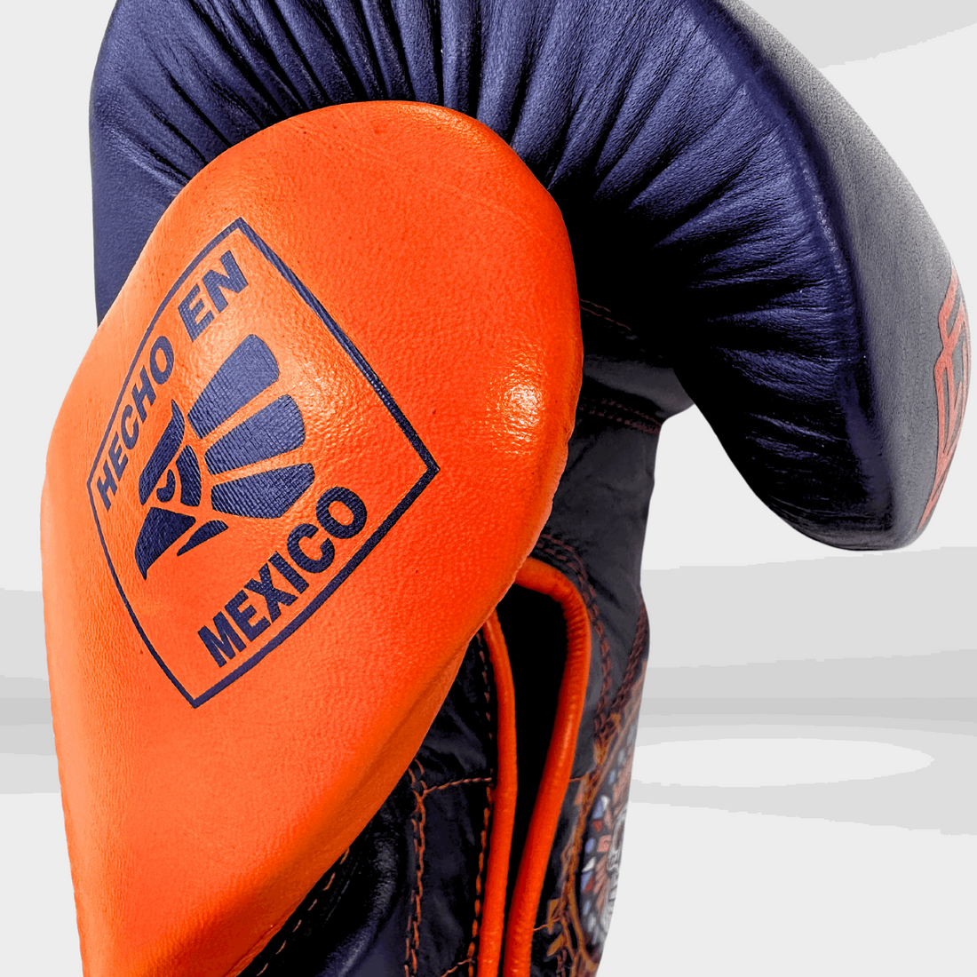 DUPLA Casco Barra Piel Negro y Dorado + AZTECA Morado y Naranja - Echaleku Boxeo