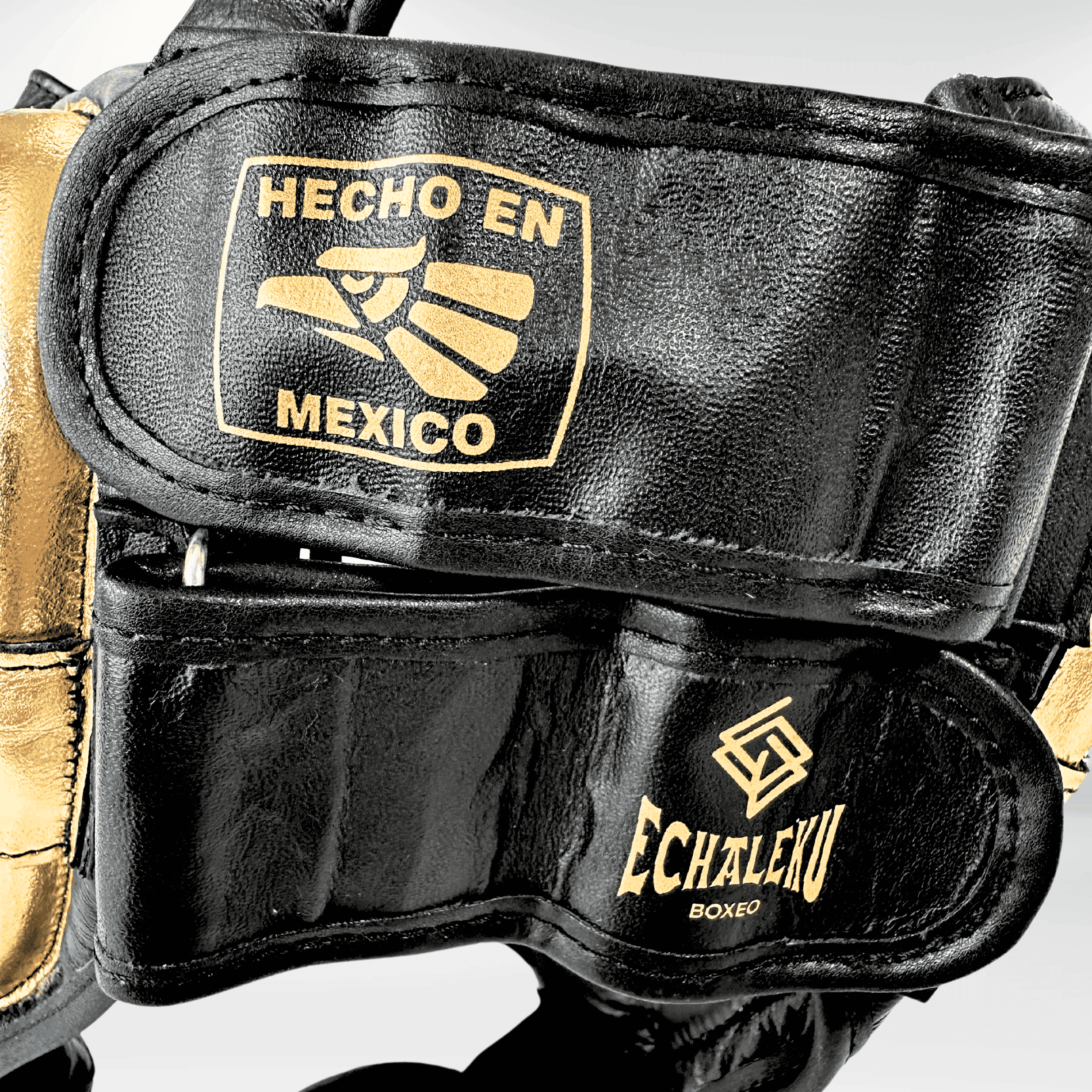 DUPLA Casco Boxeo Barra Piel Negro y Dorado + AZTECA Negro y Blanco - Echaleku Boxeo