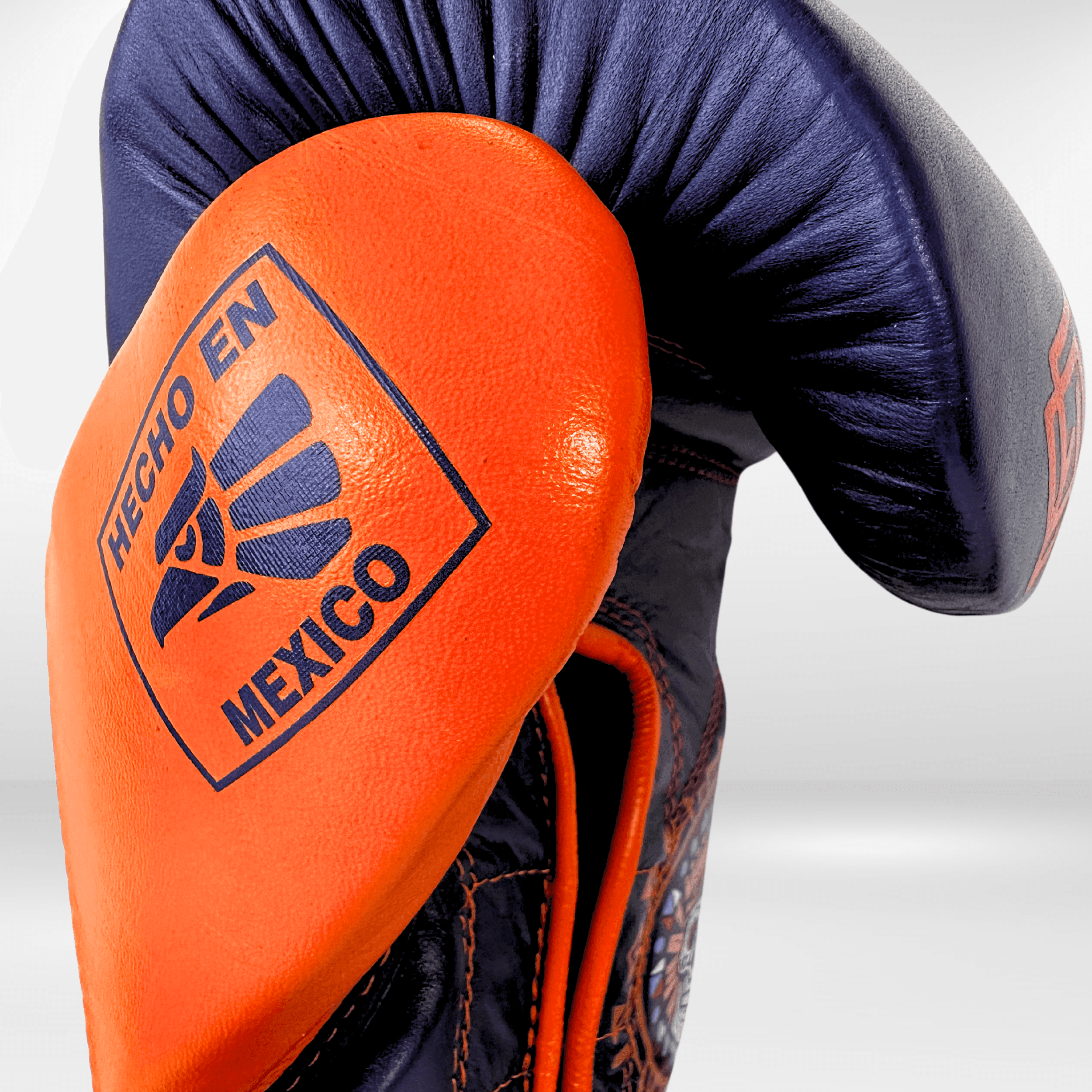 Handmix.GUANTES PREMIUM ENTRENAMIENTO BOXEO PROFESIONAL: COLECCIÓN AZTECA fabricada en México. (AZTECA). Morado y Naranja + Negro y Blanco - Echaleku Boxeo