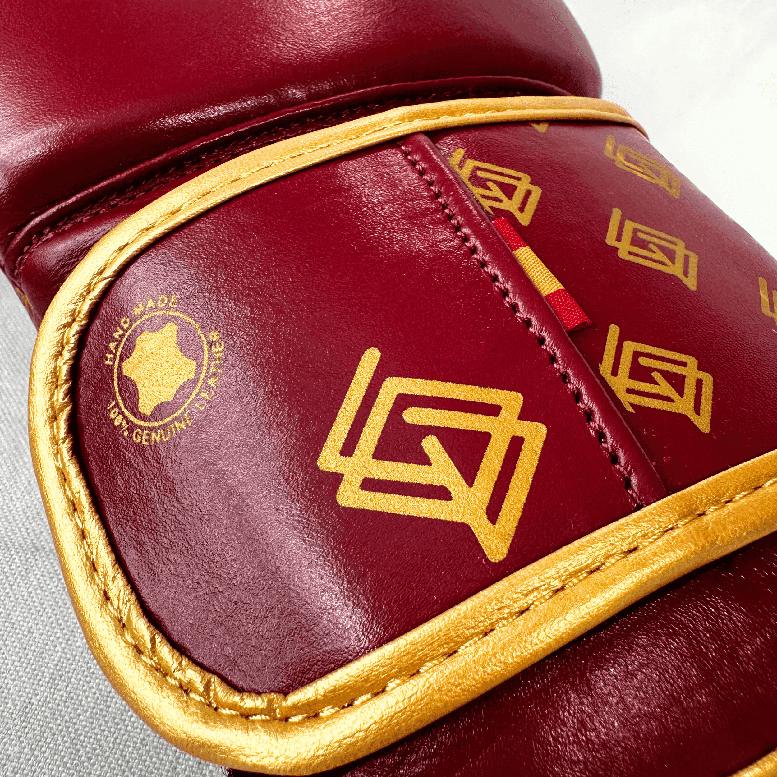 DUPLA Casco Boxeo Barra Piel Negro y Dorado + TFC2024 Burdeos y Dorado - Echaleku Boxeo