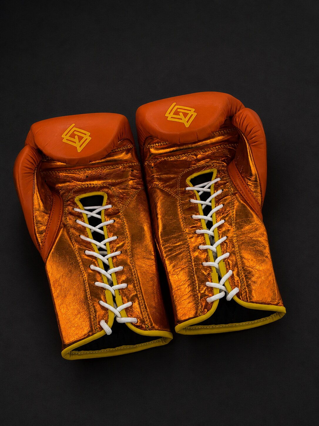 Guantes de boxeo de cuerdas Guanajuato Teja Coral, detalle de ambos cierres